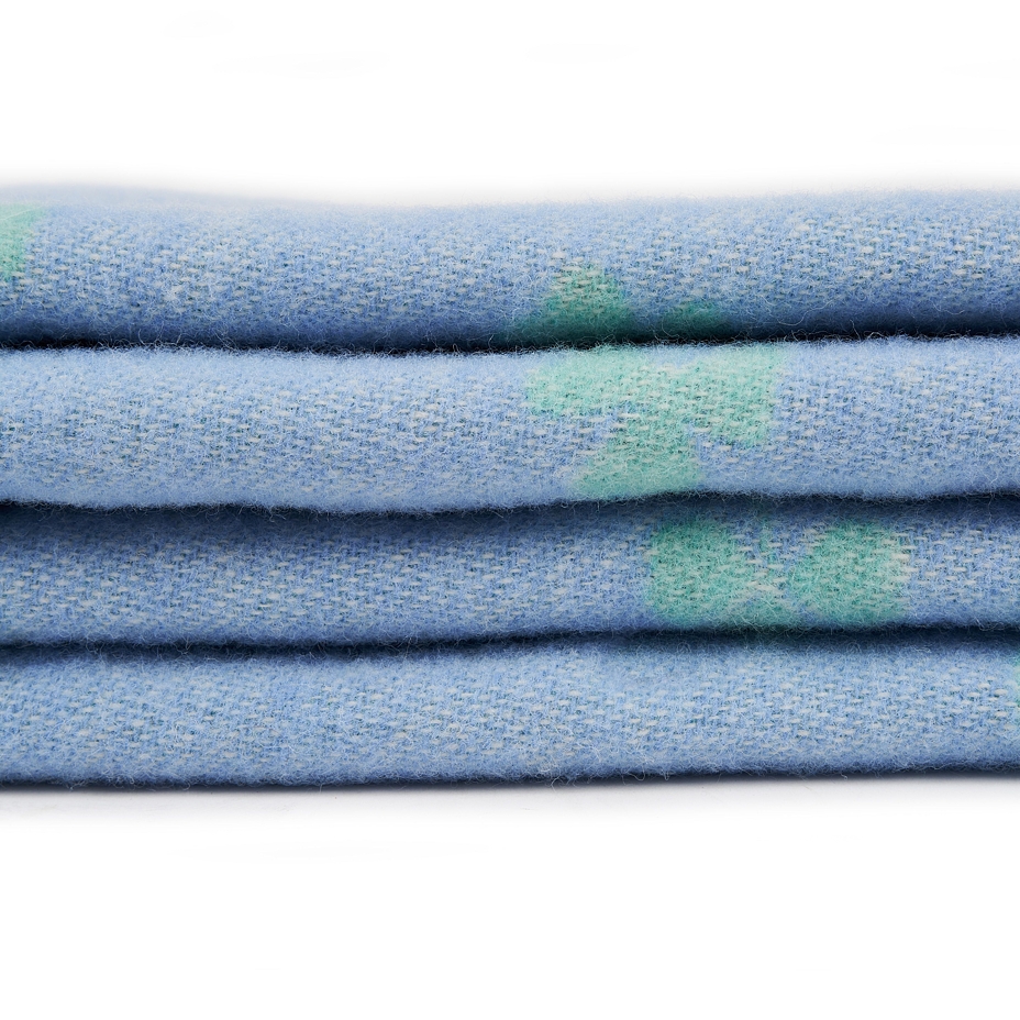 Wollen plaid Klavertje vier, blauwgroen